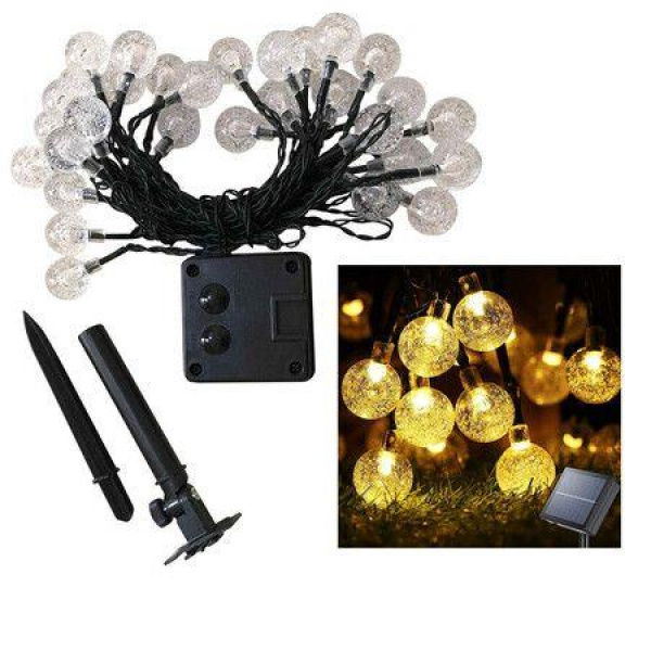 Please Correct Grammar And Spelling Without Comment Or Explanation: Solar String Lights Outdoor Waterproof 50 LED Solar Crystal Globe Lights 8 Mode 7M/24Ft Outdoor Solar Powered String Lights For Garden Patio Yard Christmas Parties Wedding (Warm White)