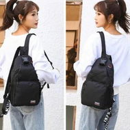 Detailed information about the product Crossbody Sling Backpack: Versatile Daypack for Men & Women with Earphone Hole