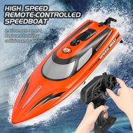 Detailed information about the product RC Boat with LED Light for Pools and Lakes, 2.4GHz Fast Remote Control Boat for Kids, Low Battery Reminder (Orange)