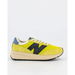 New Balance 370 Volt Yellow. Available at Platypus Shoes for $159.99