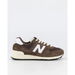 New Balance 574 Brown (225). Available at Platypus Shoes for $169.99