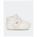 Ugg Baby Bixbee Vanilla. Available at Platypus Shoes for $79.99
