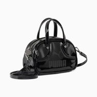 Detailed information about the product 1976 Micro 1L Grip Bag Bag in Black, Polyester by PUMA