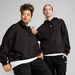 ESSENTIALS Women's Oversized Hoodie in Black, Size Small, Cotton by PUMA. Available at Puma for $80.00