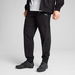 PUMATECH Men's Track Pants in Black, Size Small, Elastomultiester/Polyester. Available at Puma for $110.00